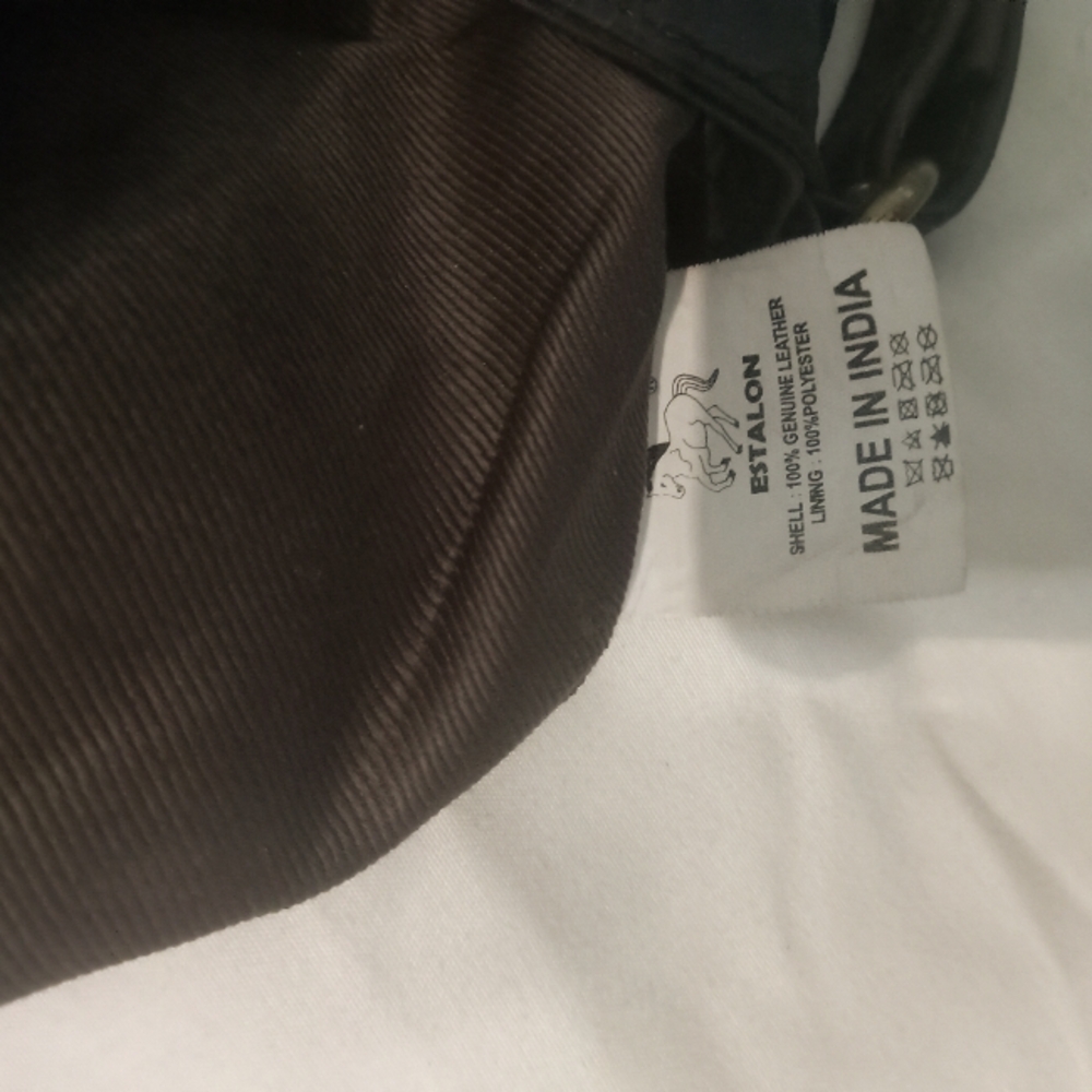 Leather Estalon bag long adj strap. Front 2 zip opening.